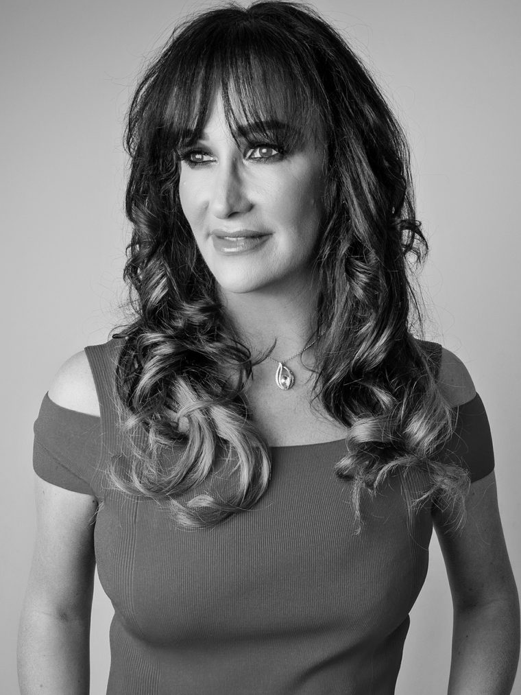 Studio portrait of Gina McKie